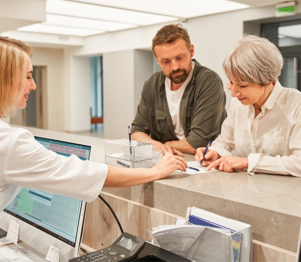 Patient completing new patient forms