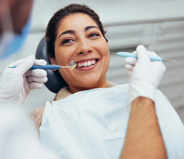Patient at dental checkup and cleaning